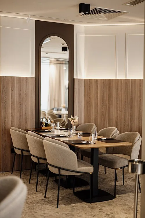 Restaurant table set for dining — real photograph